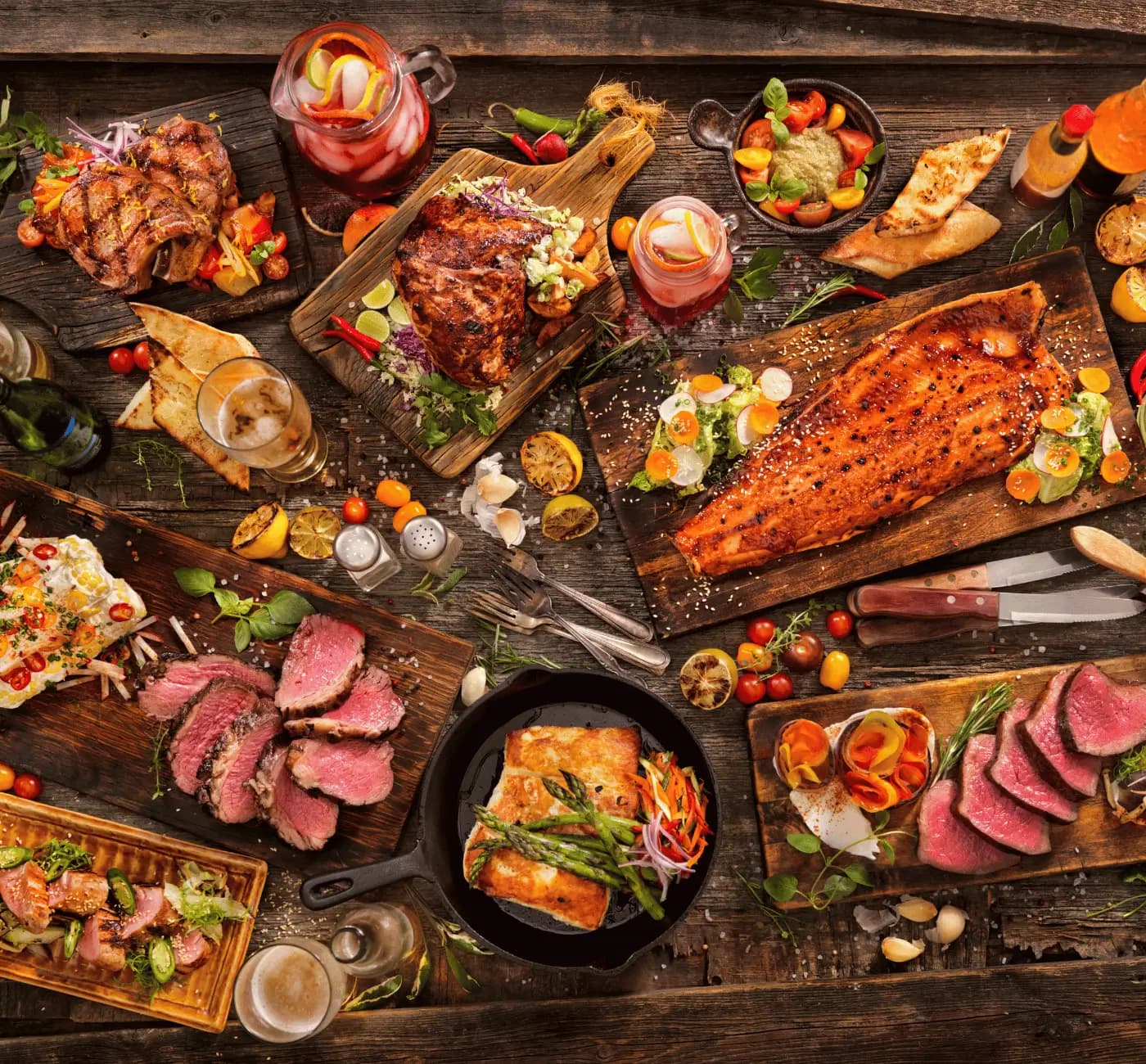 A feast of protein-rich meat dishes on a rustic table